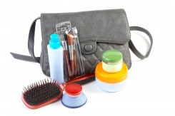 Female bag and cosmetics isolated